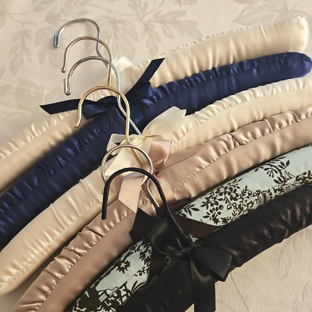 6 Satin Padded Hangers.